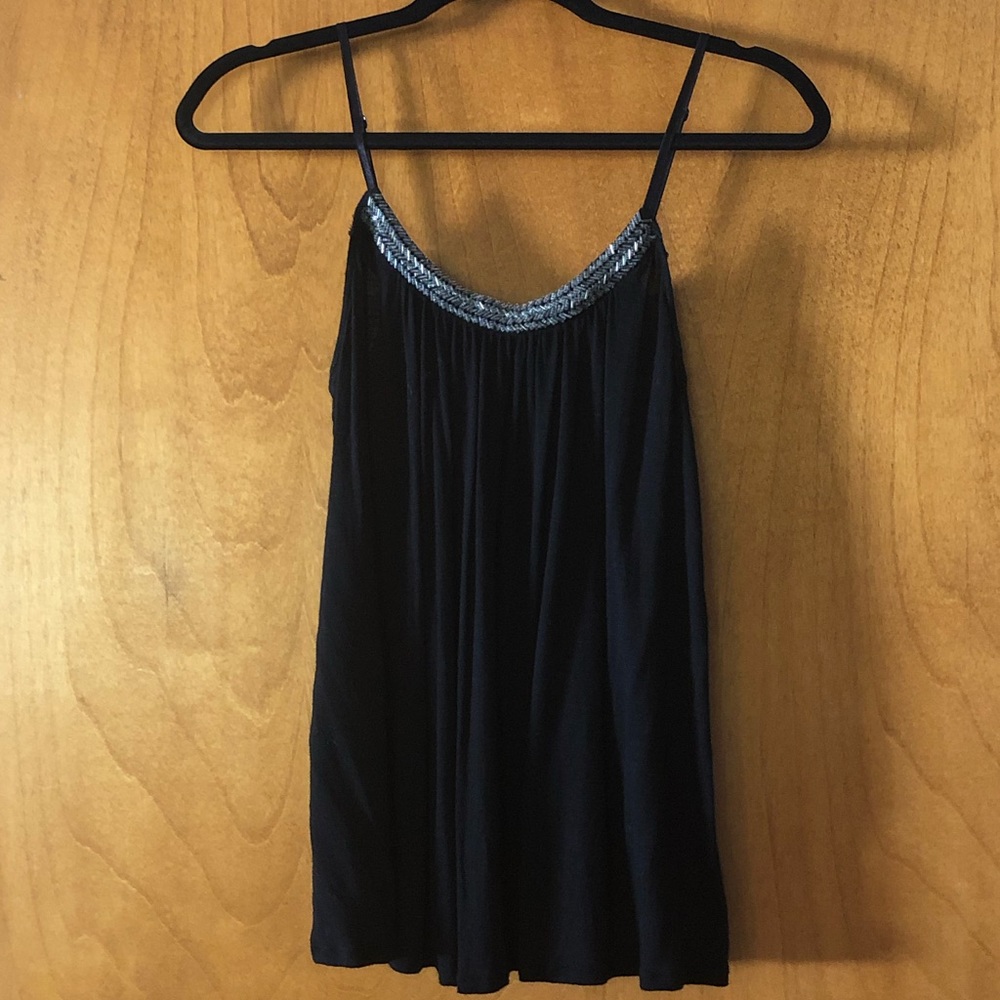 Candie’s Flowy Black Top withBeaded Neckine